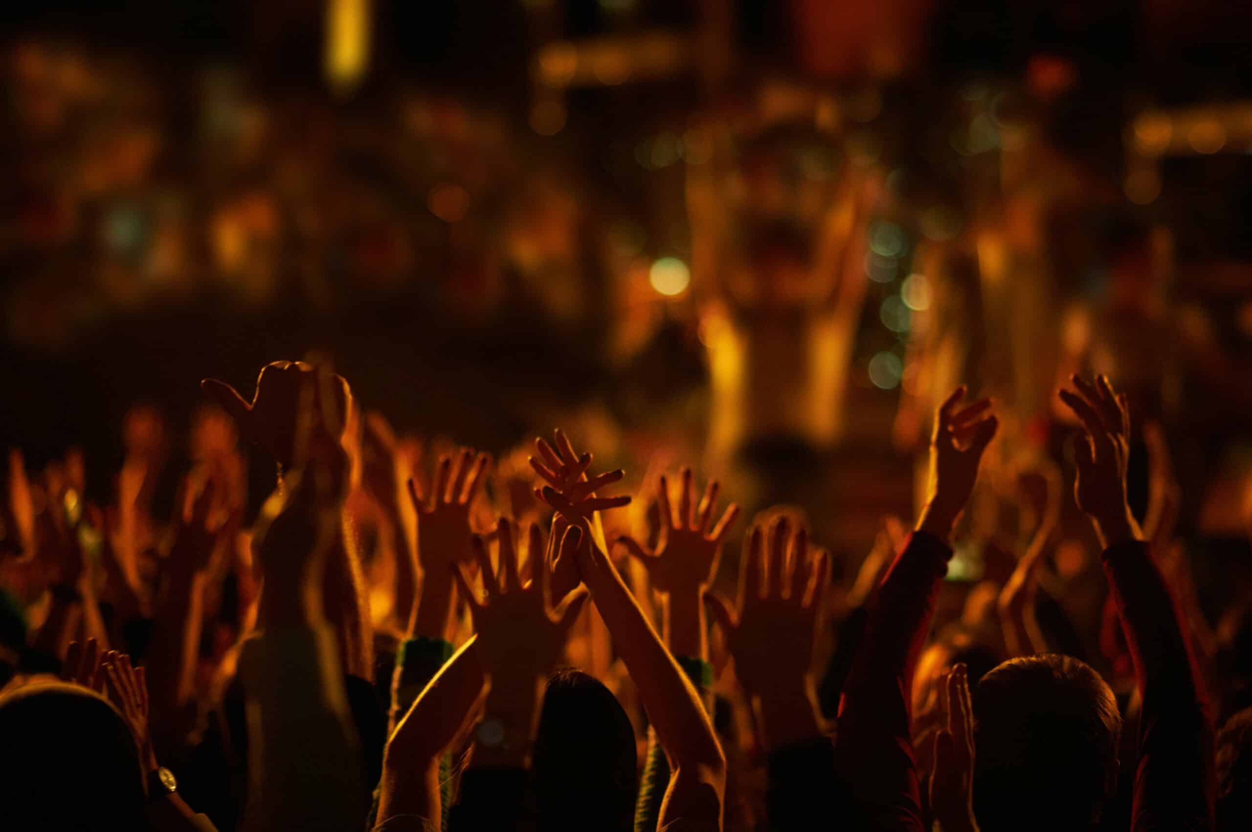 audience-with-hands-raised-at-a-music-festival-and-2023-11-27-05-09-04-utc